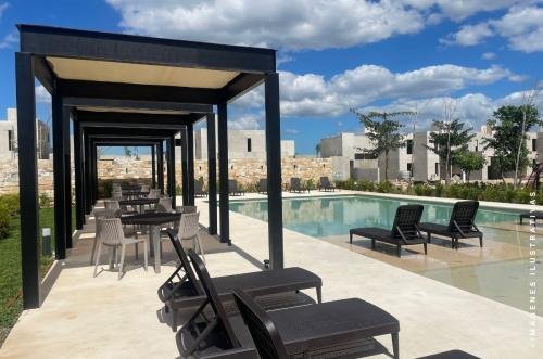 1699-47024-Casa-en-venta-en-Merida-Conkal-Aldoria-de-una-planta-en-privada-residencial_(2).jpg