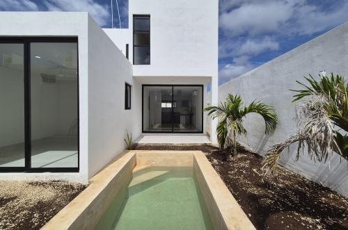 1834-50836-Casa-en-Venta-en-Gran-San-Pedro-Cholul-coN-habitación-en-planta-baja-y-alberca_(14).jpg