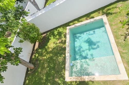 1936-54676-Casa-en-Venta-en-Real-Montejo-Mérida-con-cochera-techada-3-recámaras-y-alberca_(23).jpg