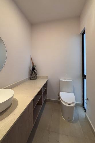 2029-54797-Casa_estilo-Townhouse-en-venta-en-cholul-al-norte-de-Merida-THULA-CITY-HOME__(16).jpg